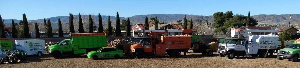Chad's Chippers trucks, chipper, and crew geared up